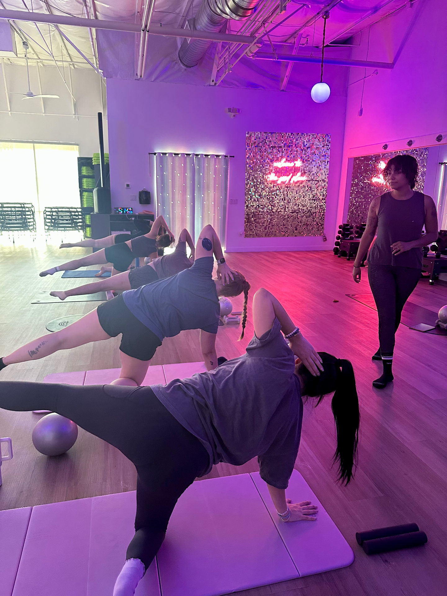 Pilates flow in violet light