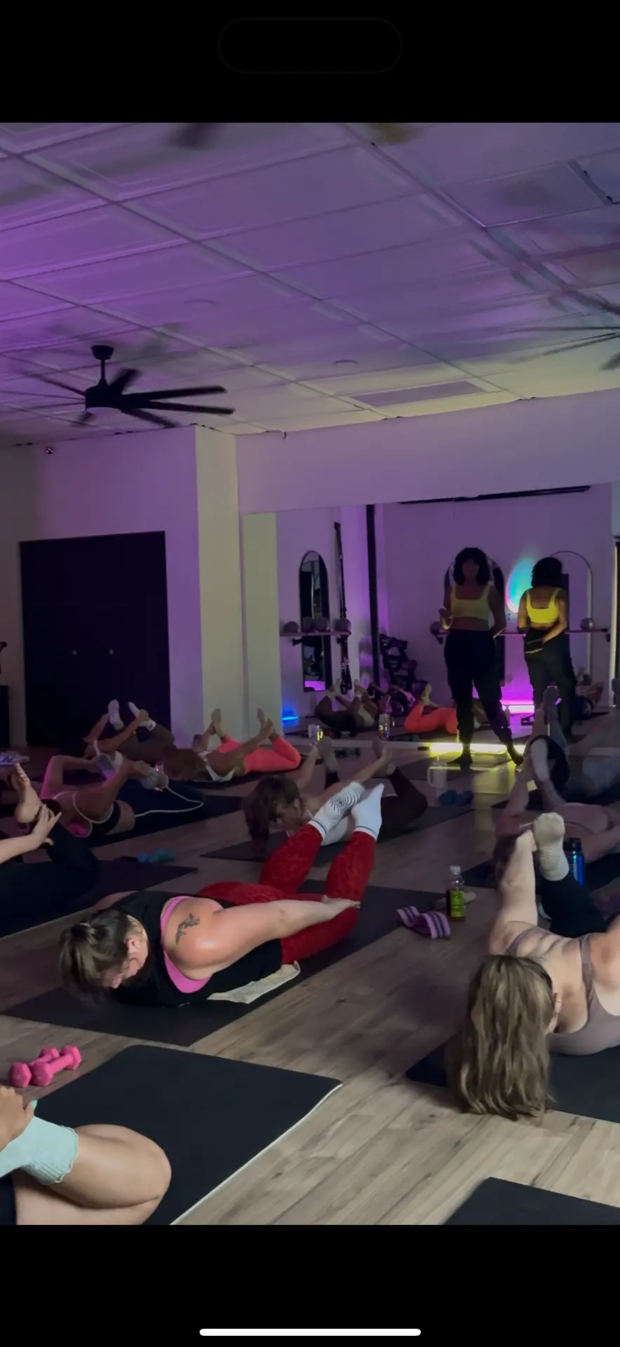 Group back-extension hold on the mats