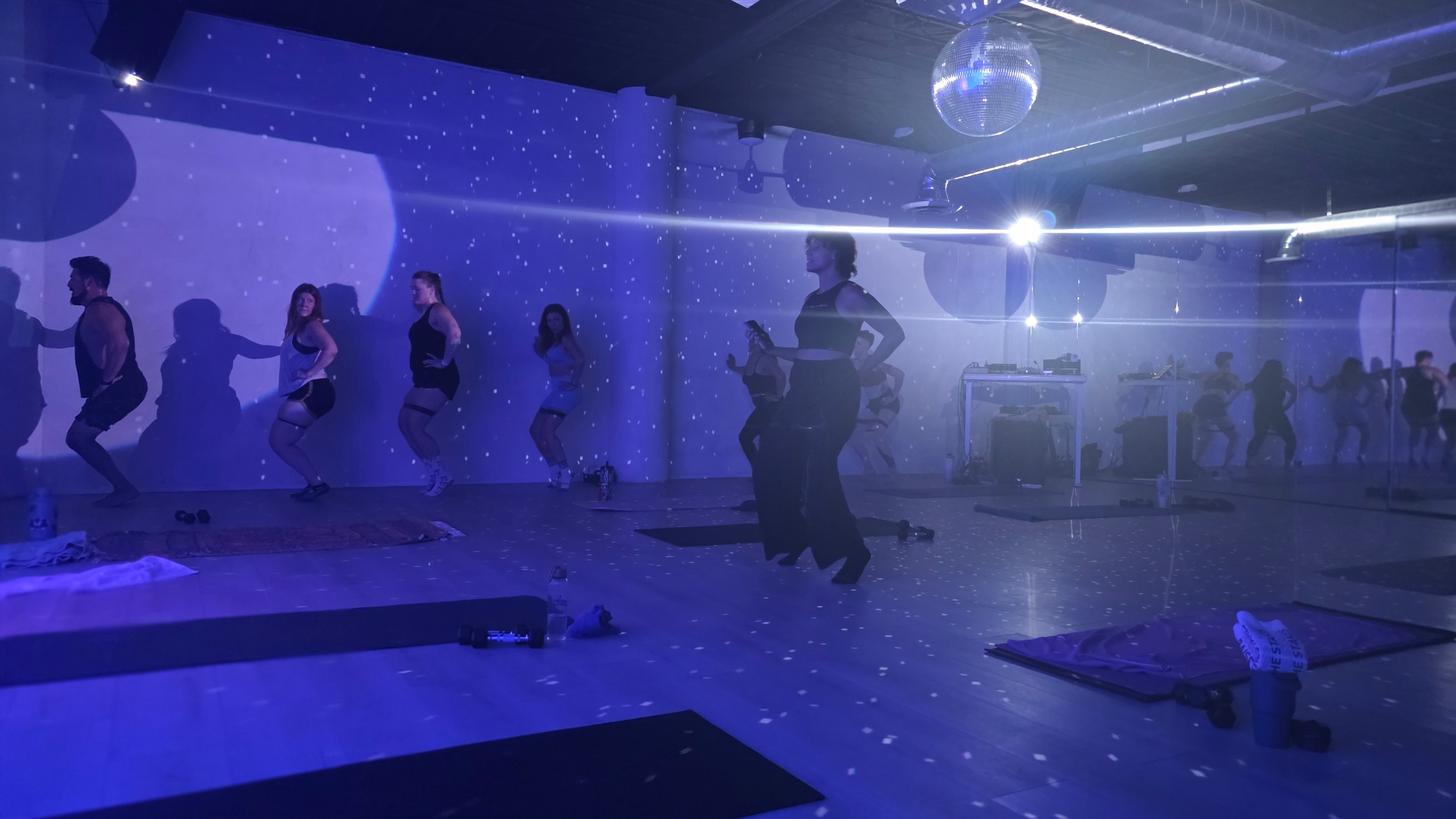 Disco ball reflections over the mat